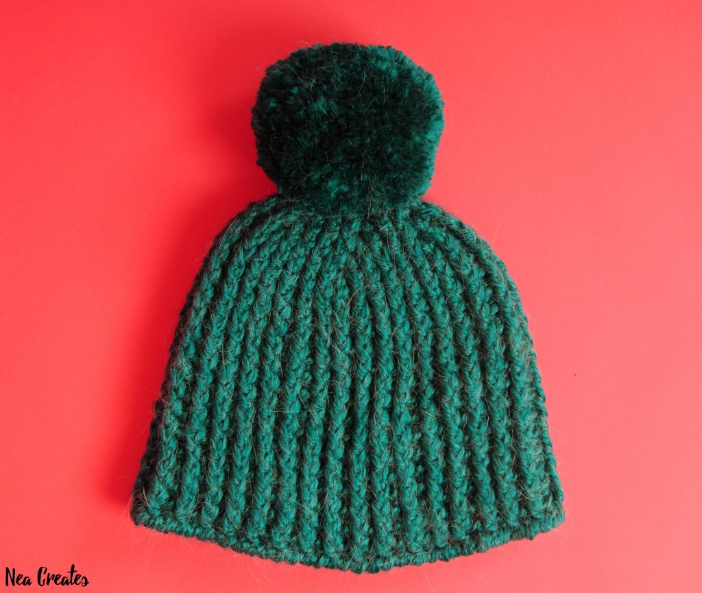 Learn how to crochet this gorgeous & warm Ribbed Winter Hat by following this FREE crochet pattern!