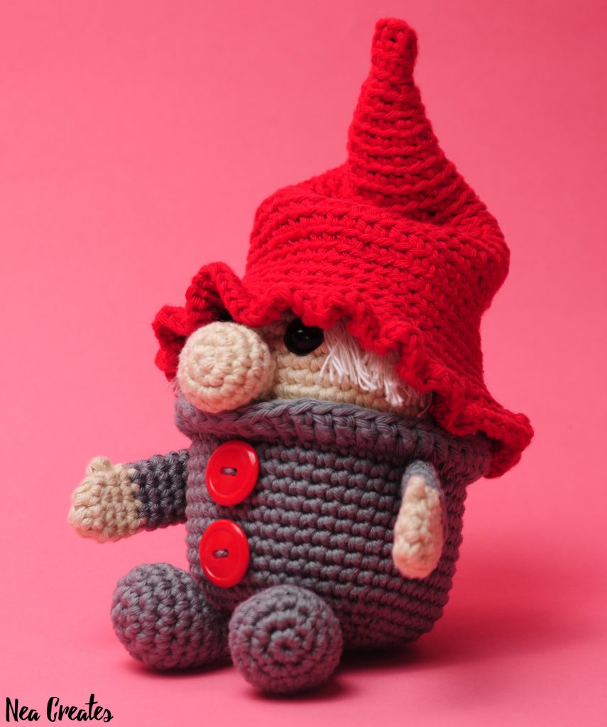 Crochet Gustav the Gnome for Christmas using this FREE amigurumi pattern! Easy/intermediate free crochet pattern, and he's so cute, with or without his hat!